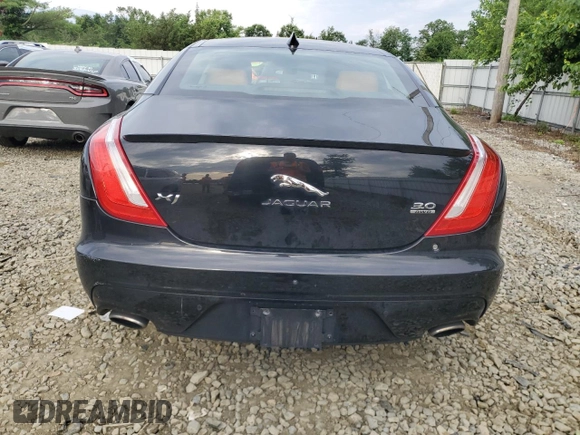 2019 Jaguar XJ R-Sport with VIN SAJWJ1CD1K8W18574, listed as a Copart auction lot 65041445 with 101,072 mi miles and Clean title. Bid and sale history available at DreamBid. Image 6.