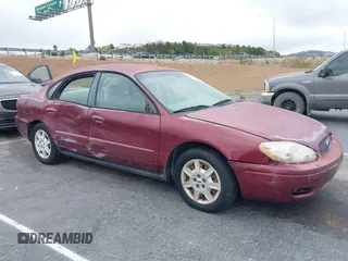 2004 Ford Taurus SE with VIN 1FAFP53214G150248, listed as a IAAI auction lot 41543177 with 99,553 mi miles and . Bid and sale history available at DreamBid. Image 6.