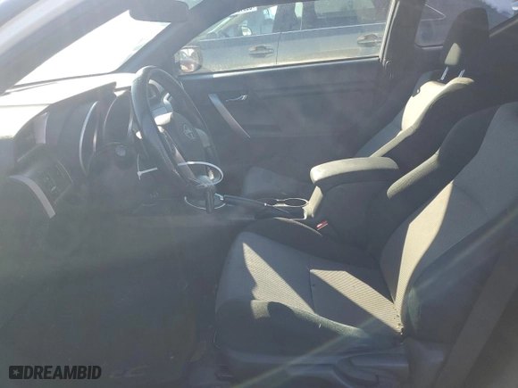 2016 Scion tC with VIN JTKJF5C72GJ022393, listed as a Copart auction lot 88352085 with 115,202 mi miles and Salvage Title. Bid and sale history available at carsss.com. Image 7.