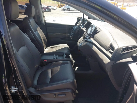 2018 Honda Odyssey Touring with VIN 5FNRL6H8XJB026247, listed as a IAAI auction lot 42298961 with 66,571 mi miles and . Bid and sale history available at DreamBid. Image 5.