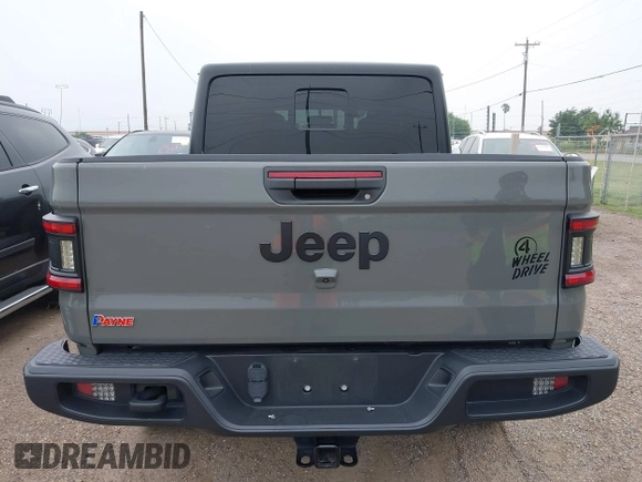 2022 Jeep Gladiator Texas Trail z VIN 1C6HJTAG2NL176011, wystawiony jako IAAI lot #42193864 z przebiegiem 27 219 mil mil oraz . Historia ofert i sprzedaży dostępna na DreamBid. Obrazek 17.