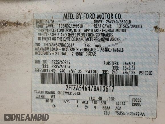 2007 Ford Freestar Cargo z VIN 2FTZA54647BA13617, wystawiony jako Copart lot #52545745 z przebiegiem Nie podano mil oraz Szkody całkowita. Historia ofert i sprzedaży dostępna na DreamBid. Obrazek 13.