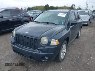 2007 Jeep Compass Sport with VIN 1J8FF47W37D122390, listed as a IAAI auction lot 41993064 with 195,253 mi miles. Bid and sale history available at carsss.com. Image 6.