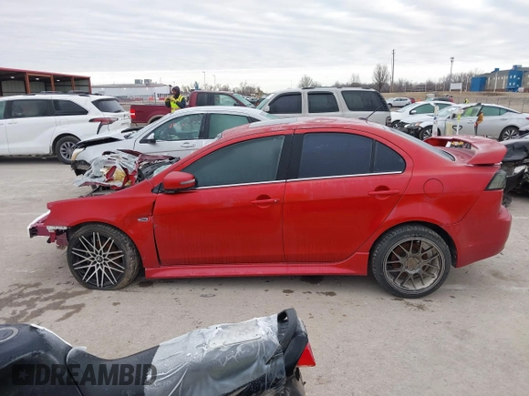 2016 Mitsubishi Lancer GT with VIN JA32U8FW1GU012988, listed as a IAAI auction lot 41498905 with 94,727 mi miles. Bid and sale history available at carsss.com. Image 13.