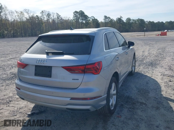 2020 Audi Q3 Premium with VIN WA1AECF36L1057823, listed as a IAAI auction lot 41912118 with 71,004 mi miles and . Bid and sale history available at DreamBid. Image 4.