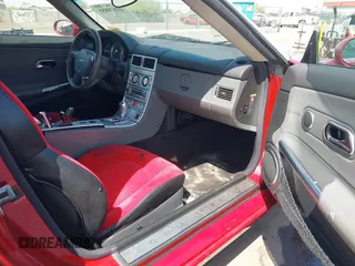 2005 Chrysler Crossfire Limited z VIN 1C3AN65L65X057205, wystawiony jako IAAI lot #41878855 z przebiegiem 209 199 mil mil oraz . Historia ofert i sprzedaży dostępna na DreamBid. Obrazek 5.