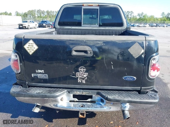 2001 Ford F-150 SuperCrew XLT with VIN 1FTRW07W41KA13131, listed as a IAAI auction lot 41922077 with 1 mi miles. Bid and sale history available at carsss.com. Image 6.