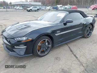 2021 Ford Mustang GT Premium with VIN 1FATP8FF4M5143096, listed as a IAAI auction lot 42013344 with 20,221 mi miles and . Bid and sale history available at DreamBid. Image 2.