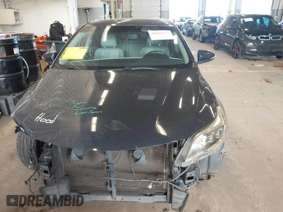2014 Toyota Avalon Limited with VIN 4T1BK1EB1EU128987, listed as a IAAI auction lot 42034677 with 104,153 mi miles and . Bid and sale history available at DreamBid. Image 13.