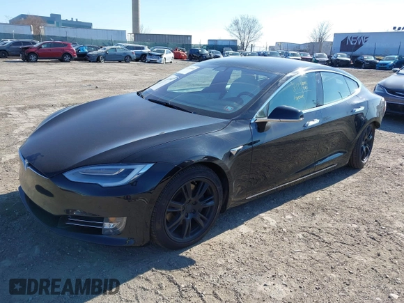 2020 Tesla Model S Long Range with VIN 5YJSA1E23LF381872, listed as a IAAI auction lot 41763046 with 96,720 mi miles and . Bid and sale history available at DreamBid. Image 25.