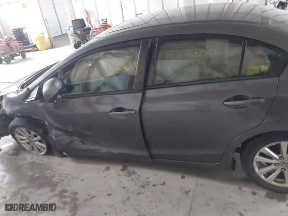 2012 Honda Civic Sdn EX with VIN 2HGFB2F80CH329781, listed as a IAAI auction lot 41624733 with 246,819 mi miles. Bid and sale history available at carsss.com. Image 14.