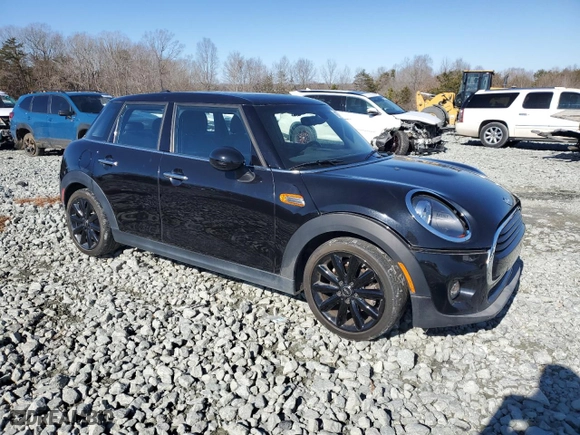 2019 MINI Hardtop 4 Door Cooper with VIN WMWXU1C57K2J02819, listed as a Copart auction lot 42778285 with 27,621 mi miles and Salvage Title. Bid and sale history available at carsss.com. Image 4.
