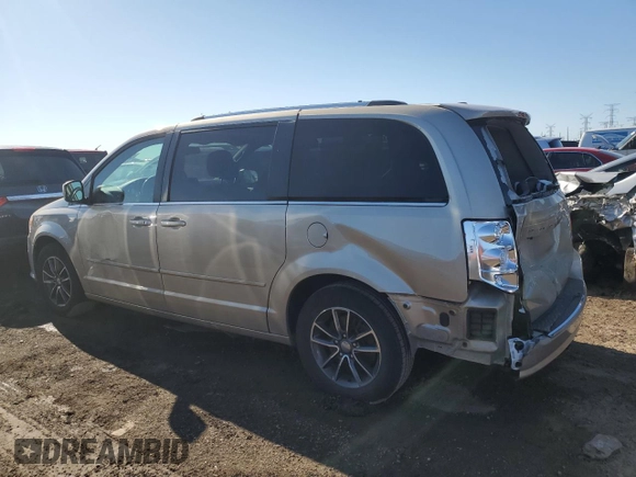 2016 Dodge Grand Caravan SXT with VIN 2C4RDGCG5GR219517, listed as a Copart auction lot 50052405 with 104,552 mi miles and Salvage Title. Bid and sale history available at DreamBid. Image 2.