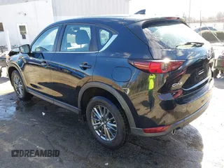 2017 Mazda CX-5 Sport with VIN JM3KFABL5H0141895, listed as a IAAI auction lot 41718108 with 69,312 mi miles. Bid and sale history available at carsss.com. Image 3.