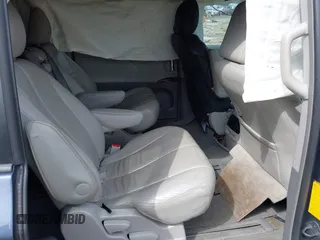 2014 Toyota Sienna XLE with VIN 5TDYK3DC9ES511035, listed as a IAAI auction lot 41884115 with 153,071 mi miles. Bid and sale history available at carsss.com. Image 8.