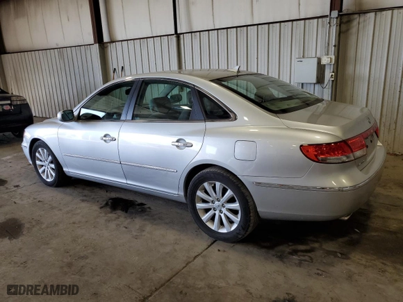 2010 Hyundai Azera GLS with VIN KMHFC4DD7AA473519, listed as a Copart auction lot 71422234 with 120,080 mi miles and Salvage Title. Bid and sale history available at carsss.com. Image 2.