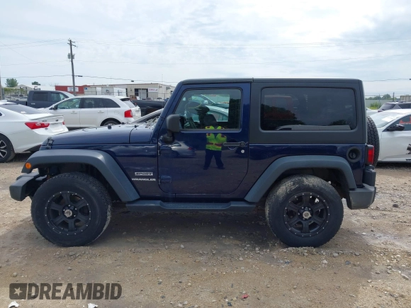 2013 Jeep Wrangler Sport with VIN 1C4AJWAG2DL505655, listed as a IAAI auction lot 42557213 with 185,502 mi miles and . Bid and sale history available at DreamBid. Image 14.