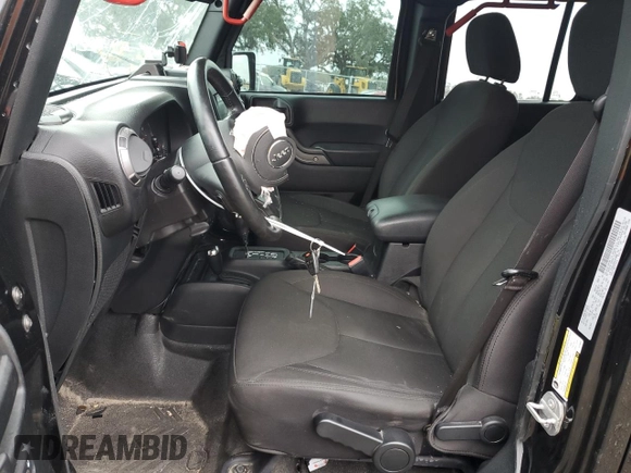 2018 Jeep Wrangler JK Unlimited Sport S with VIN 1C4BJWDG0JL818800, listed as a Copart auction lot 88286715 with 114,011 mi miles and Salvage Title. Bid and sale history available at carsss.com. Image 7.