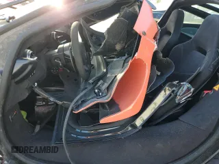 2021 McLaren 765LT z VIN SBM14RCA3MW765537, wystawiony jako Copart lot #39177933 z przebiegiem Nie podano mil oraz Szkody całkowita. Historia ofert i sprzedaży dostępna na DreamBid. Obrazek 7.