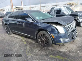 2013 Cadillac XTS Luxury with VIN 2G61P5S32D9121518, listed as a IAAI auction lot 41736434 with 97,250 mi miles. Bid and sale history available at carsss.com. Image 1.