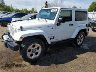 2013 Jeep Wrangler Sahara z VIN 1C4AJWBG0DL517849, wystawiony jako Copart lot #58392505 z przebiegiem 119 499 mil mil oraz Czysty tytuł • Clean title. Historia ofert i sprzedaży dostępna na DreamBid. Obrazek 1.