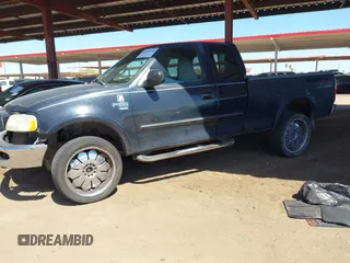 2000 Ford F-150 XL z VIN 1FTRX18L1YNA05567, wystawiony jako IAAI lot #42054536 z przebiegiem 245 018 mil mil oraz . Historia ofert i sprzedaży dostępna na DreamBid. Obrazek 17.