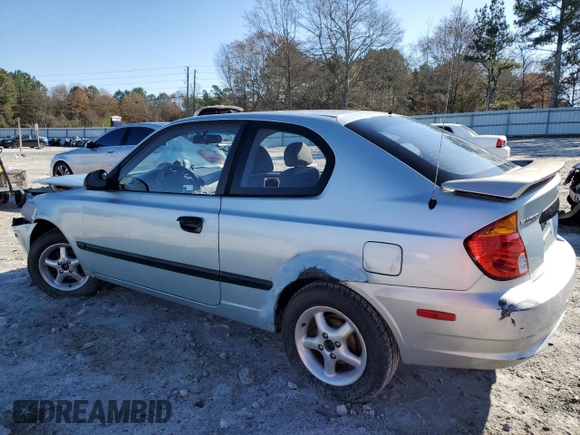 2003 Hyundai Accent with VIN KMHCF35C73U273610, listed as a Copart auction lot 85868294 with 168,203 mi miles and Salvage Title. Bid and sale history available at carsss.com. Image 2.