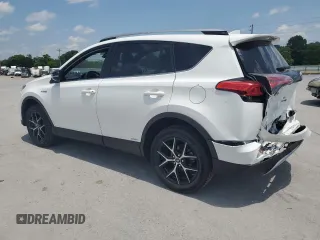 2018 Toyota RAV4 Hybrid SE with VIN JTMJJREVXJD212926, listed as a Copart auction lot 60215465 with 71,876 mi miles and Salvage title. Bid and sale history available at DreamBid. Image 2.