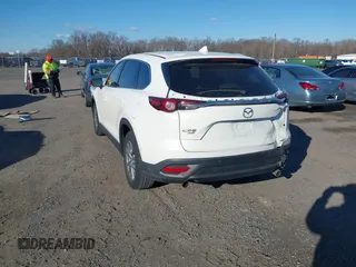 2016 Mazda CX-9 Touring with VIN JM3TCBCY5G0122551, listed as a IAAI auction lot 41613683 with 137,474 mi miles. Bid and sale history available at carsss.com. Image 3.