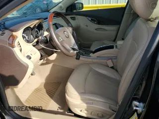 2013 Buick LaCrosse Premium 1 с VIN 1G4GF5E33DF228876, выставлен на аукционе Copart как лот 64781645 с пробегом 108 212 миль миль и Списание • Salvage title. История ставок и продаж доступна на DreamBid. Изображение 7.