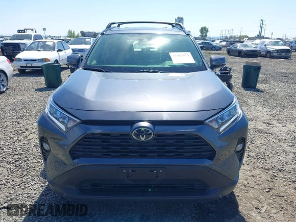 2019 Toyota RAV4 XLE with VIN JTMP1RFV9KD522379, listed as a IAAI auction lot 42002573 with 38,895 mi miles and . Bid and sale history available at DreamBid. Image 12.