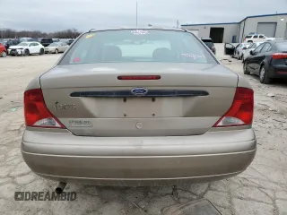 2003 Ford Focus LX with VIN 1FAFP33P73W114861, listed as a Copart auction lot 44859405 with 100,574 mi miles and Salvage Title. Bid and sale history available at carsss.com. Image 6.