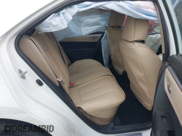 2016 Toyota Corolla L with VIN 5YFBURHE5GP485592, listed as a IAAI auction lot 41930690 with 121,861 mi miles and . Bid and sale history available at DreamBid. Image 8.