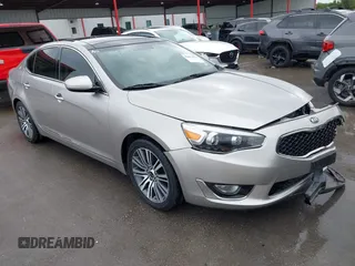 2014 Kia Cadenza Limited with VIN KNALN4D71E5137744, listed as a IAAI auction lot 42063014 with 61,310 mi miles. Bid and sale history available at carsss.com. Image 1.