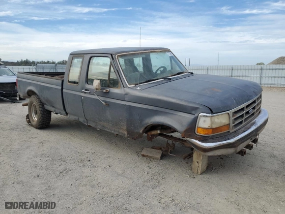 1994 Ford F-250 HD with VIN 1FTHX26G6RKB58004, listed as a Copart auction lot 77279664 with 124,556 mi miles and Salvage Title. Bid and sale history available at carsss.com. Image 4.