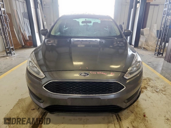 2018 Ford Focus SE with VIN 1FADP3FE0JL311760, listed as a Copart auction lot 63621755 with 81,000 mi miles and Salvage title. Bid and sale history available at DreamBid. Image 5.