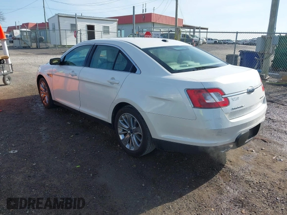 2010 Ford Taurus Limited with VIN 1FAHP2FWXAG112342, listed as a IAAI auction lot 42005142 with 148,947 mi miles. Bid and sale history available at carsss.com. Image 3.