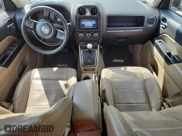 2015 Jeep Patriot High Altitude with VIN 1C4NJRFB5FD114125, listed as a Copart auction lot 62475615 with 104,438 mi miles and Salvage title. Bid and sale history available at DreamBid. Image 8.