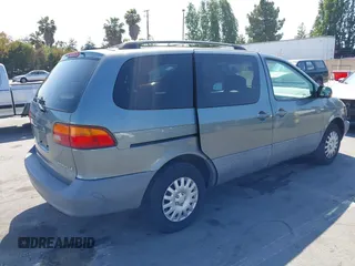 2000 Toyota Sienna LE z VIN 4T3ZF13C9YU175999, wystawiony jako IAAI lot #42438959 z przebiegiem 151 546 mil mil oraz . Historia ofert i sprzedaży dostępna na DreamBid. Obrazek 4.