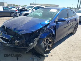 2019 Kia Forte LXS with VIN 3KPF24AD2KE061065, listed as a IAAI auction lot 41887404 with 77,628 mi miles and . Bid and sale history available at DreamBid. Image 2.