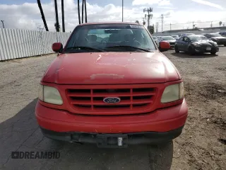 2003 Ford F-150 XL with VIN 1FTRX07213KB93777, listed as a Copart auction lot 46950285 with 176,332 mi miles and Salvage title. Bid and sale history available at DreamBid. Image 5.