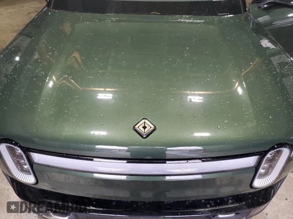 2023 Rivian R1T Adventure with VIN 7FCTGAAA0PN024165, listed as a Copart auction lot 84265444 with Not Provided miles and Salvage Title. Bid and sale history available at carsss.com. Image 11.