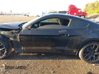 2019 Ford Mustang EcoBoost z VIN 1FA6P8TH7K5180949, wystawiony jako IAAI lot #42093614 z przebiegiem 82 936 mil mil oraz . Historia ofert i sprzedaży dostępna na DreamBid. Obrazek 15.