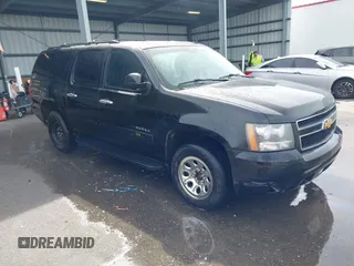 2013 Chevrolet Suburban LT with VIN 1GNSCJE06DR141176, listed as a IAAI auction lot 41603608 with 241,079 mi miles. Bid and sale history available at carsss.com. Image 1.