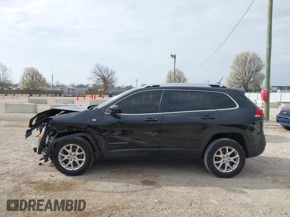 2015 Jeep Cherokee Latitude with VIN 1C4PJMCB6FW527448, listed as a IAAI auction lot 42074461 with 139,795 mi miles and . Bid and sale history available at carsss.com. Image 13.