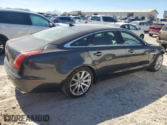 2013 Jaguar XJ Portfolio with VIN SAJWJ2GDXD8V45921, listed as a Copart auction lot 49289825 with 115,152 mi miles and Salvage title. Bid and sale history available at DreamBid. Image 3.