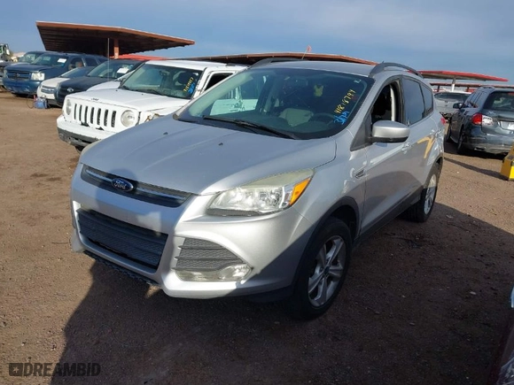 2014 Ford Escape SE with VIN 1FMCU9GX6EUB20308, listed as a IAAI auction lot 41818794 with 141,587 mi miles. Bid and sale history available at carsss.com. Image 2.