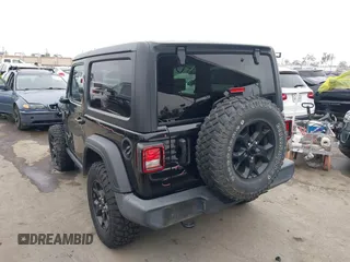 2021 Jeep Wrangler Sport with VIN 1C4GJXAN5MW627228, listed as a IAAI auction lot 42170010 with 56,965 mi miles and . Bid and sale history available at DreamBid. Image 3.