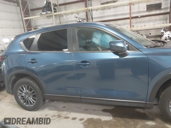 2019 Mazda CX-5 Touring with VIN JM3KFBCM1K0584369, listed as a IAAI auction lot 41657765 with 77,934 mi miles. Bid and sale history available at carsss.com. Image 13.