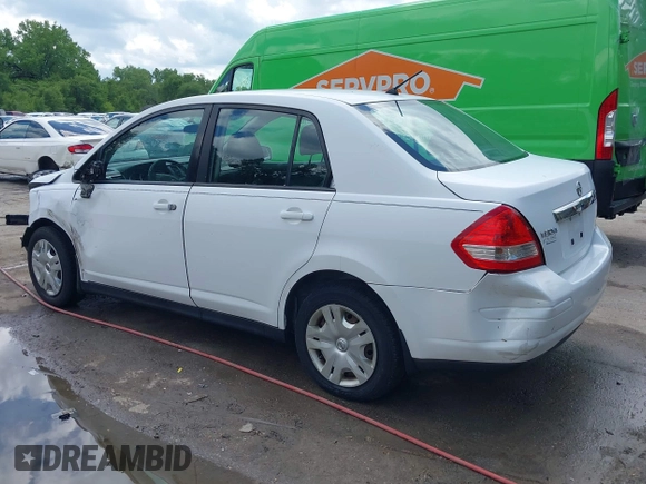 2010 Nissan Versa S with VIN 3N1BC1AP2AL409285, listed as a IAAI auction lot 42182721 with 266,855 mi miles and . Bid and sale history available at DreamBid. Image 3.